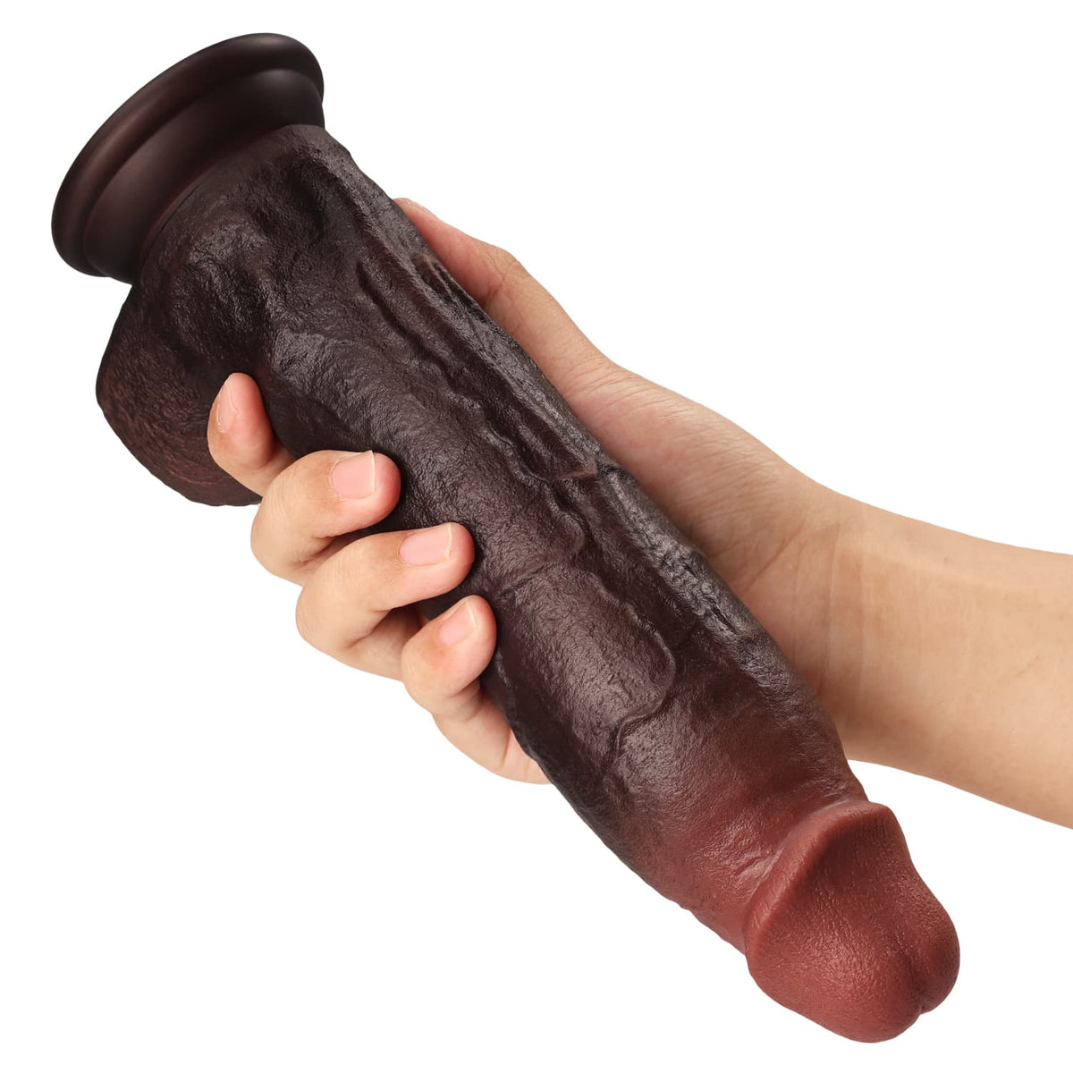Dildo Jett in der Hand gehalten