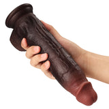 Dildo Jett in der Hand gehalten